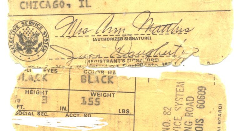 Torn remains of a Vietnam War draft card, dated 1972.